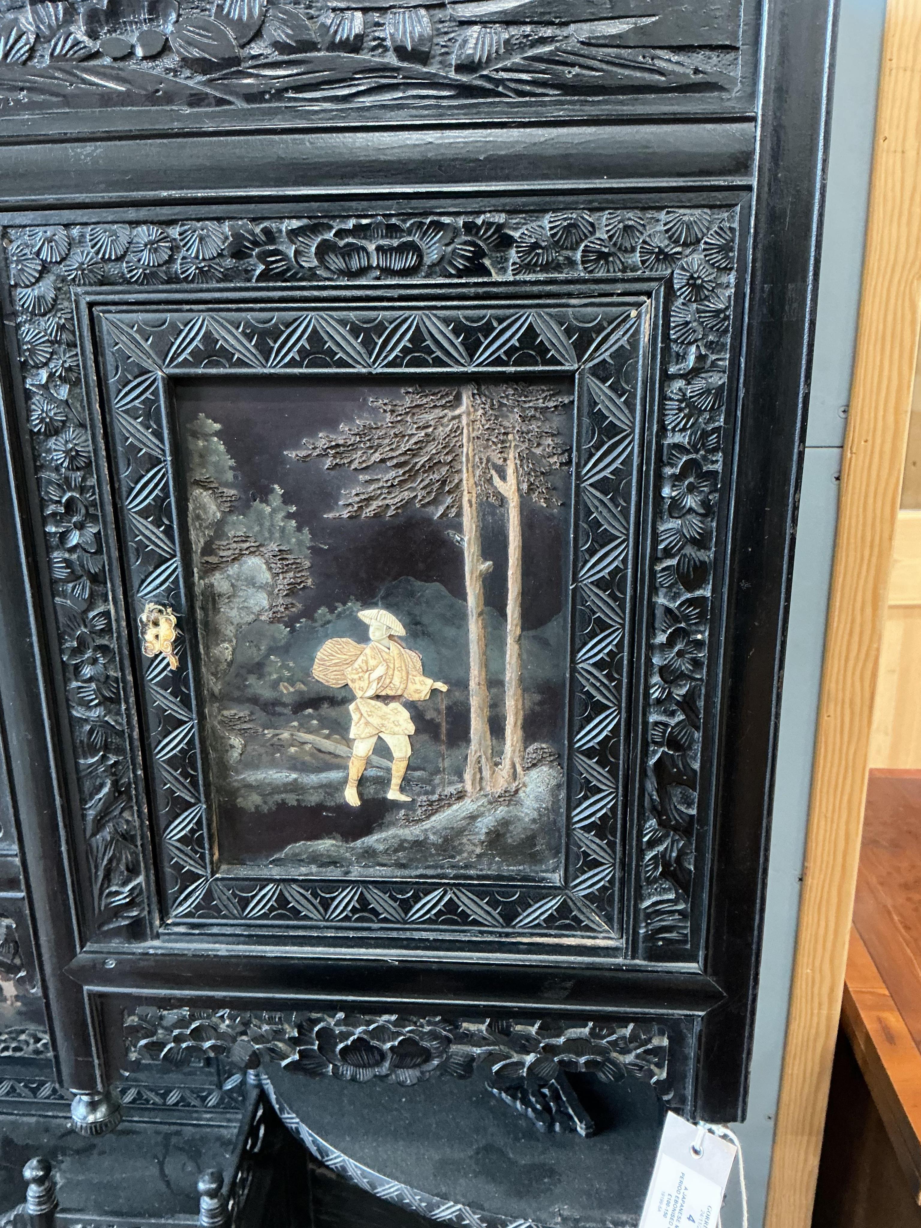 A Japanese Meiji period ebonised cabinet, width 110cm, depth 32cm, height 150cm CITES Submission reference Q4A31H9Q